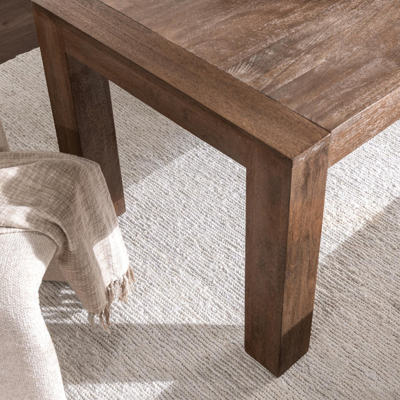 Classic Home Glendale dining table in toasted chestnut finish, showcasing a sturdy wooden surface and contemporary design.
