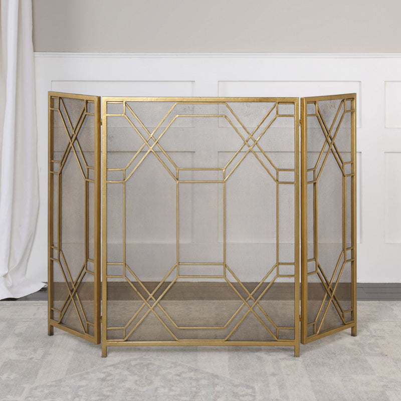 Uttermost Rosen gold fireplace screen with elegant metal frame and decorative design, perfect for enhancing fireplace decor.