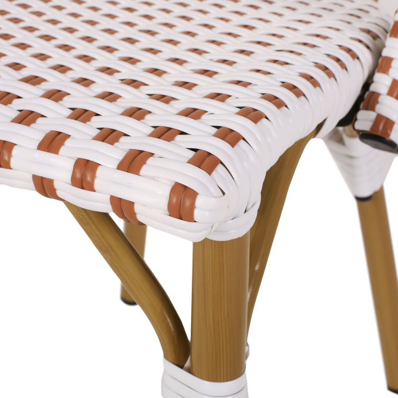 Set of two Noble House outdoor rattan and aluminum French bistro chairs with woven seats and curved armrests.