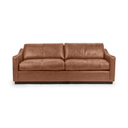 Classic Home Aspen stationary sofa with plush fabric upholstery and cushioned back, featuring a modern design for living room comfort
