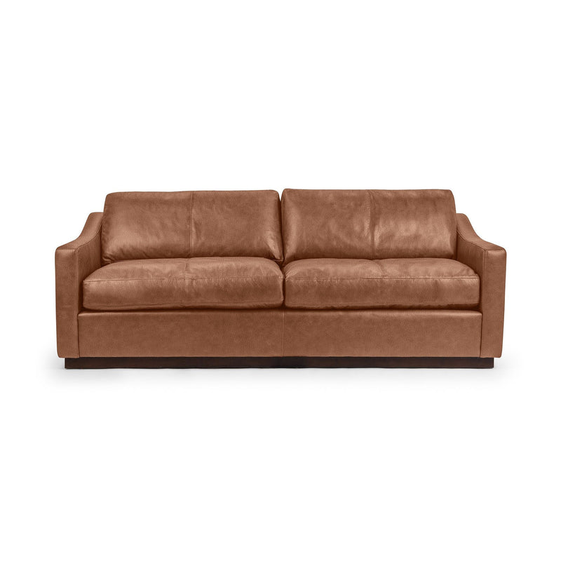 Classic Home Aspen stationary sofa with plush fabric upholstery and cushioned back, featuring a modern design for living room comfort