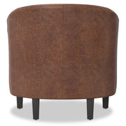 Handcrafted Austin armchair by Simpli-Home, featuring a plush fabric cushion and wooden legs in a cozy living room setting.