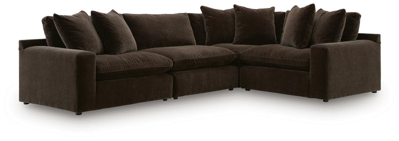 Benchcraft Maxton Heights stationary sectional sofa with plush cushions and modern design, shown in a cozy living room setting.