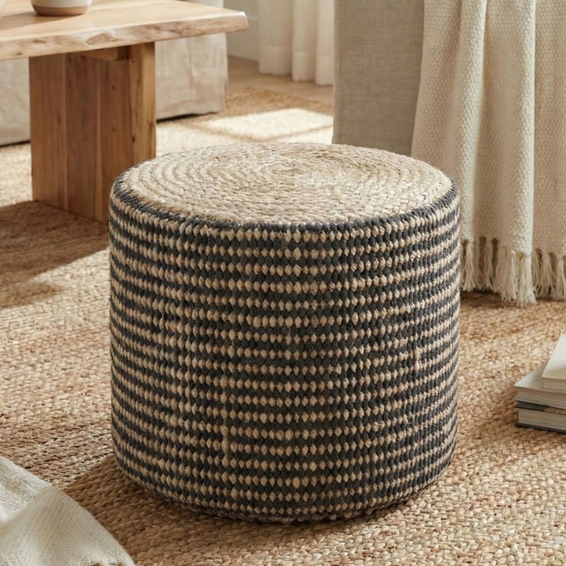 Larissa handcrafted round braided pouf by Simpli-Home, beige accent pouf with woven texture for stylish seating or decor.