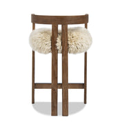 Jennifer Taylor Home Millwick low back counter stool with wooden legs, upholstered seat, and modern design for counter height use.