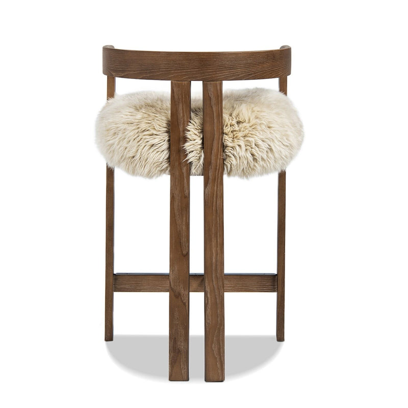 Jennifer Taylor Home Millwick low back counter stool with wooden legs, upholstered seat, and modern design for counter height use.