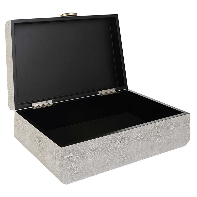 Lalique Art Deco box by Uttermost featuring intricate glass design and elegant geometric patterns on a decorative basket or box.