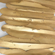 Uttermost Lev metal wall decor in white and gold with an abstract, modern design suitable for contemporary interior styling.