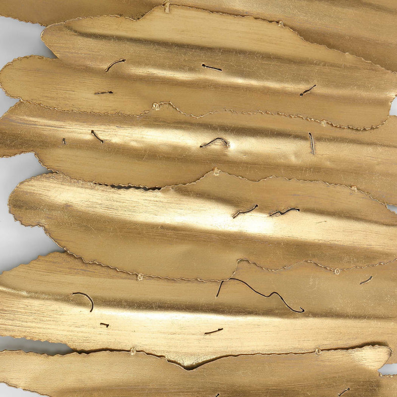 Uttermost Lev metal wall decor in white and gold with an abstract, modern design suitable for contemporary interior styling.