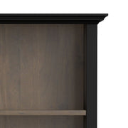 Simpli-Home Amherst bookcase with adjustable shelves, featuring a sturdy wooden frame and multiple storage compartments.