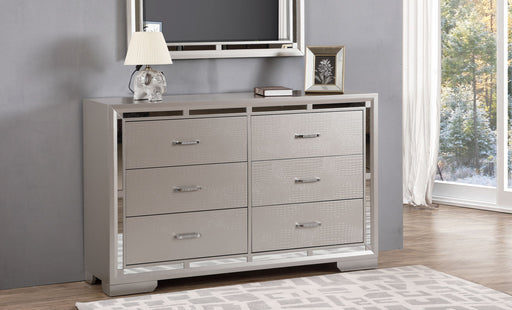 Silver Champagne Alana dresser by Glory Furniture featuring sleek drawer fronts and modern design in a stylish bedroom setting.