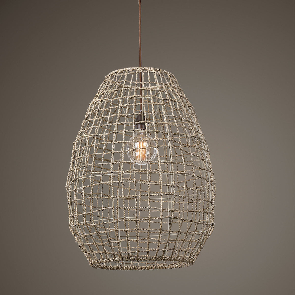 Beige Cross-Weave 1 Light Pendant by Uttermost, modern pendant lighting with a woven design hanging from a ceiling mount.