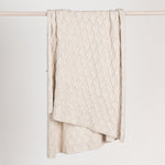 Ivory Catalina throw blanket by Classic Home, soft and cozy fabric perfect for adding warmth and style to your living space.