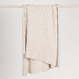 Ivory Catalina throw blanket by Classic Home, soft and cozy fabric perfect for adding warmth and style to your living space.