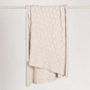 Ivory Catalina throw blanket by Classic Home, soft and cozy fabric perfect for adding warmth and style to your living space.