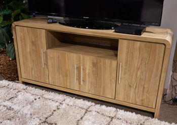 Signature Design by Ashley extra large brown TV stand with open shelves and storage compartments for modern living rooms.