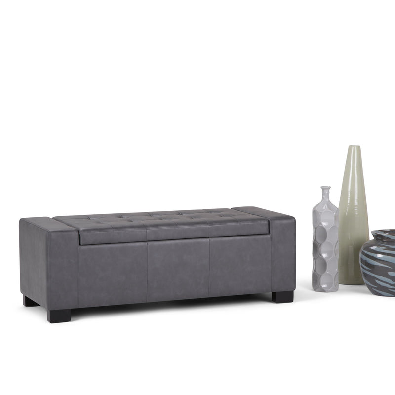 Large Simpli-Home Laredo storage ottoman with fabric upholstery and spacious interior for extra seating and storage.