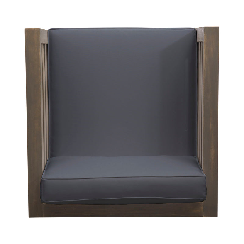 Noble House outdoor acacia wood patio arm chair with fabric cushion, showing a sturdy wooden frame and comfortable seating.