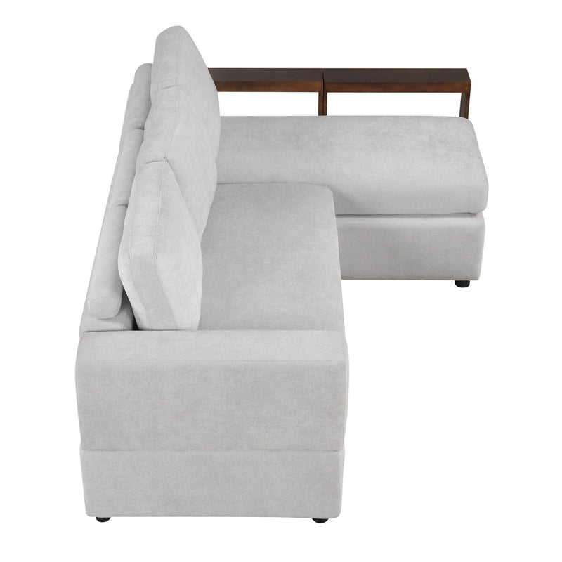 Noble House stationary sectional sofa with upholstered cushions and reversible armrests, ideal for a modern living room setting.