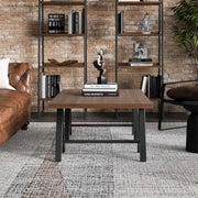Handcrafted solid wood sawhorse coffee table by Simpli-Home with a rustic design and sturdy construction.