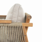 Noble House Sumbawa outdoor club arm chair with woven rattan-style frame and cushioned seat for patio or garden use