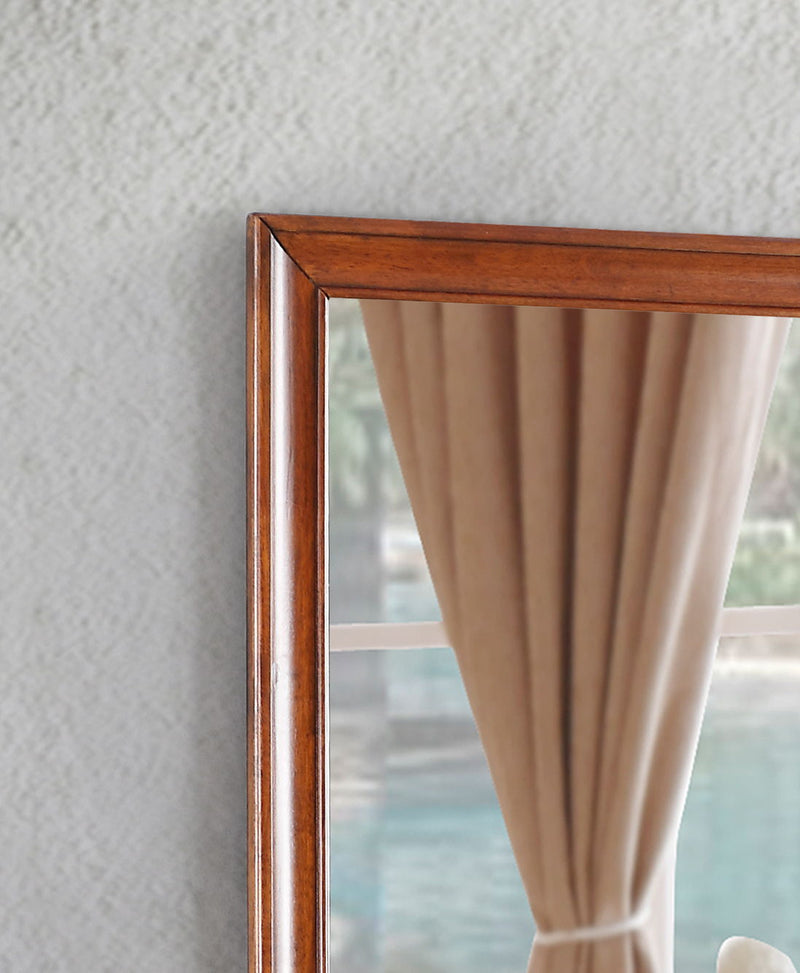 Glory Furniture LaVita mirror with sleek frame, hanging on a wall, reflecting a modern interior design.