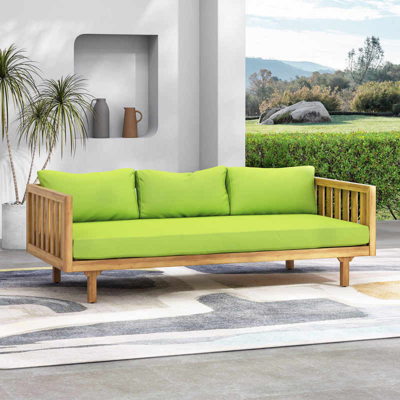 Noble House Claremont 3-seater teak acacia wood daybed with water-resistant cushions, ideal for outdoor lounging and relaxation.
