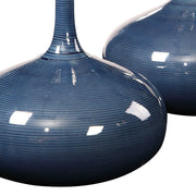 Set of two blue Uttermost Zayan vases with sleek, modern design, ideal for decorative display in living spaces.