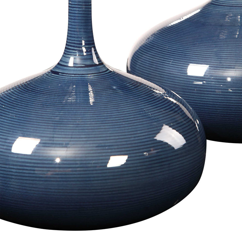 Set of two blue Uttermost Zayan vases with sleek, modern design, ideal for decorative display in living spaces.