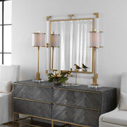 Uttermost Balkan Iron Wall Mirror with a decorative metal frame, showcasing a vintage-inspired design and reflective glass surface.