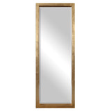 Gold Edmonton Leaner Floor Mirror by Uttermost with a sleek, full-length design and modern frame, standing upright in a contemporary setting.