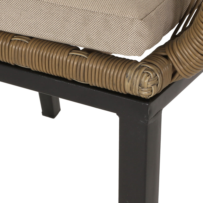 Modern wicker arm chair with water-resistant cushions in brown and beige, ideal for stylish outdoor or indoor dining spaces.