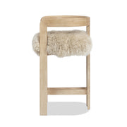 Jennifer Taylor Home Millwick low back counter stool with wooden legs and upholstered seat at a counter height of 24-27 inches.