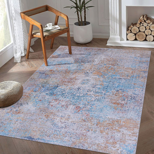 Maval - 6' X 9' Washable Area Rug - Yellow - R&R Furniture Gallery (Fountain Valley, CA)