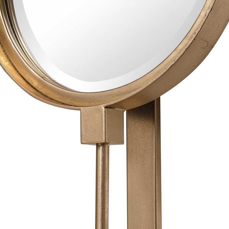Uttermost wall mirror with a round button-style frame, featuring a sleek and modern design for stylish wall decor.