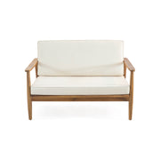 Outdoor acacia wood loveseat set with matching coffee table from Noble House, featuring two-seater outdoor furniture on a patio.