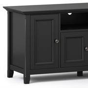 Simpli-Home Amherst wide TV media stand with open shelves and storage compartments for entertainment equipment.