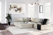 Signature Design by Ashley® Bales stationary sectional with plush fabric and modern design, shown in a stylish living room setting.
