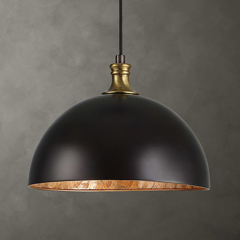 Placuna 1-light bronze pendant light by Uttermost, featuring a sleek modern design with a warm metallic finish.