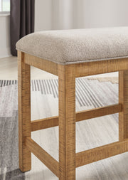 Havonplane - XL Counter Height Upholstered Dining Bench - Brown - R&R Furniture Gallery (Fountain Valley, CA)