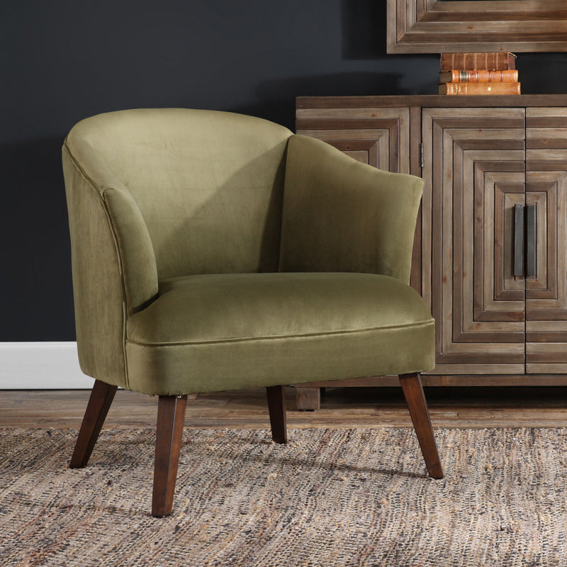 Uttermost Conroy accent chair in olive green fabric with a modern, stylish design and wooden legs.