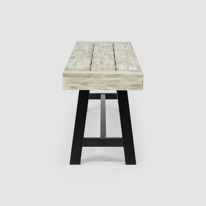 Noble House Carlisle dining bench with wooden legs and upholstered seat, ideal for kitchen or dining room seating.