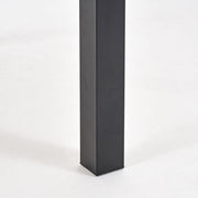 Black rectangular outdoor dining table with iron legs by Noble House, suitable for patio or garden dining spaces.
