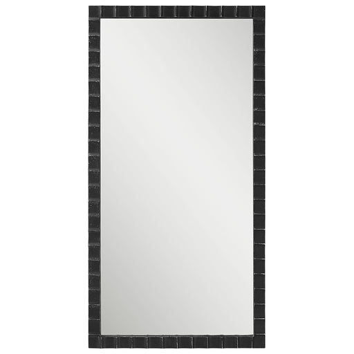 Uttermost Dandridge industrial black wall mirror with round metal frame and modern design, reflecting a stylish interior.