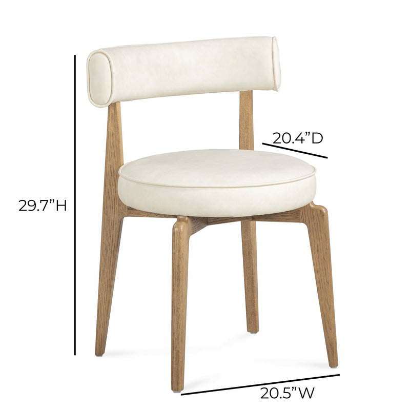 TOV Furniture Nikita dining side chair with sleek design and upholstered seat, ideal for modern dining rooms.