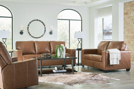 Signature Design by Ashley Bolsena living room set with stationary sofas and loveseats, featuring plush cushions and modern upholstery.