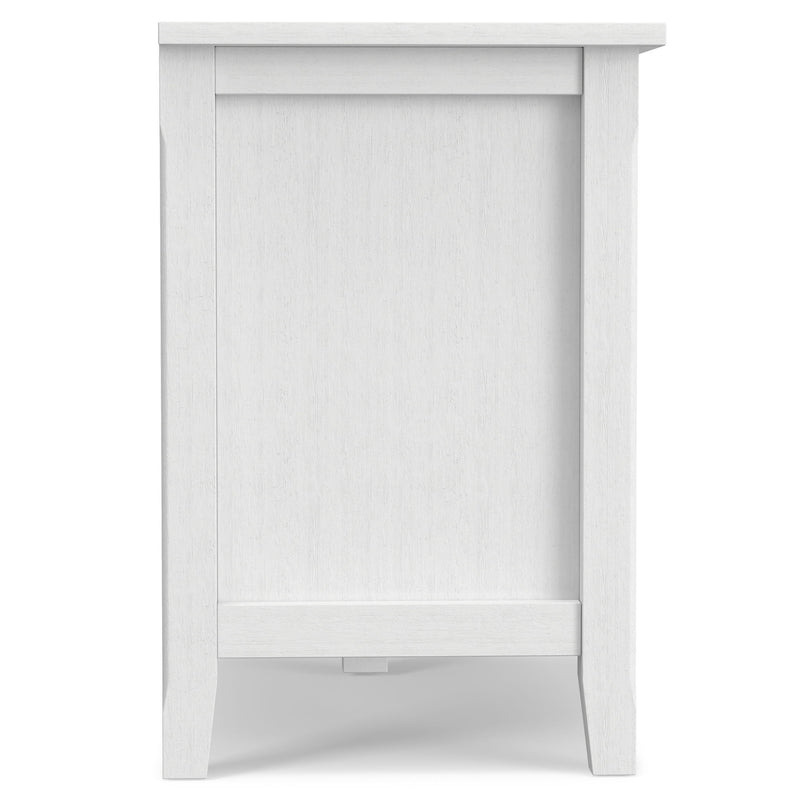 Handcrafted Warm Shaker TV media stand by Simpli-Home featuring wood finish, open shelving, and storage compartments for media devices.