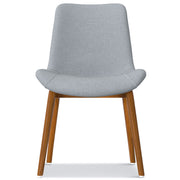 Pair of Loretta upholstered dining chairs by Simpli-Home, featuring cushioned seats and wooden legs for comfortable dining seating.