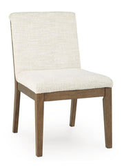 Set of two Benchcraft® Marxmore dining upholstered side chairs in beige and brown with wooden legs.