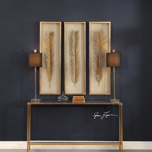 Set of three Uttermost Palma leaf shadow box wall decor in gold, featuring intricate leaf designs for stylish home decoration.